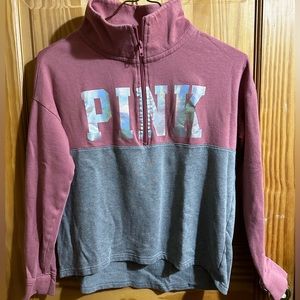 Cool mauve Pink thing, the tag says XS but it’s a comfort fit.